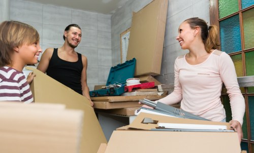 Boxes and furniture being loaded for a Tolworth storage quote
