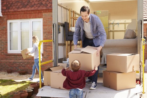 Removal van and packing boxes for Tolworth moving services